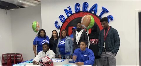 2 Liberty High School seniors take football careers to next level