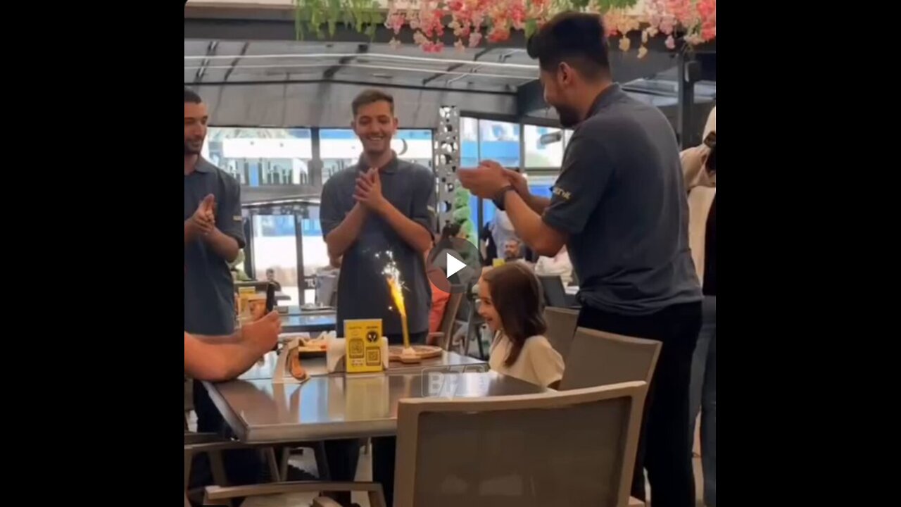 Little cute girl cried with joy at her father's birthday surprise.