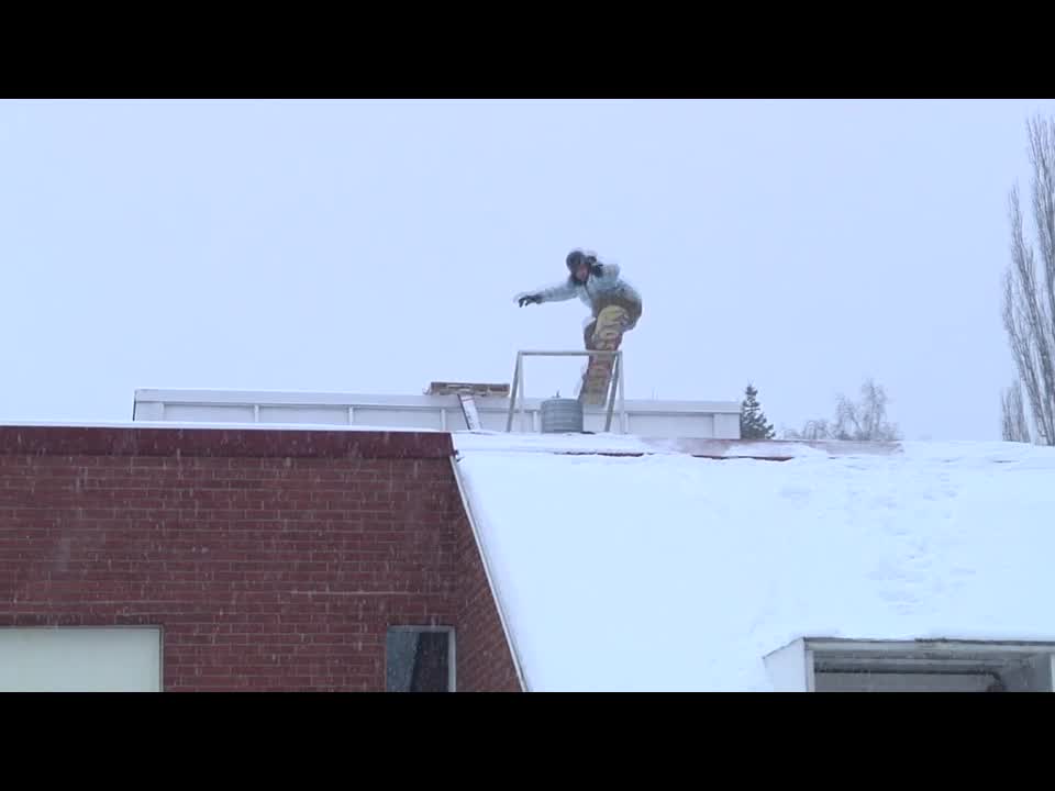 Epic Snowboarding Off Of A Roof Fail