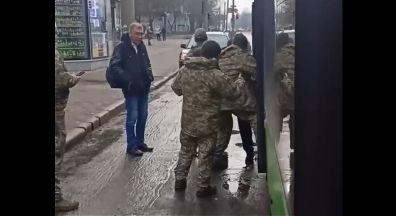 Agents Drag A Ukraininan Man Off A Bus To Conscript Him Into The Military