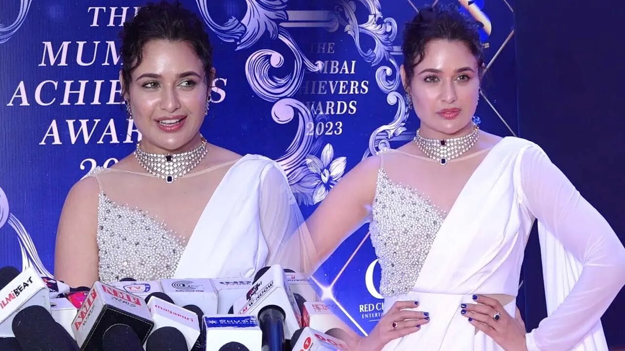 Yuvika Chaudhary Looks Beautiful in White Dress At Mumbai Achievers Aware 2023