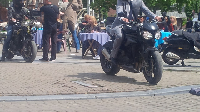 Motorcycle blasts through Amsterdam market at high speed