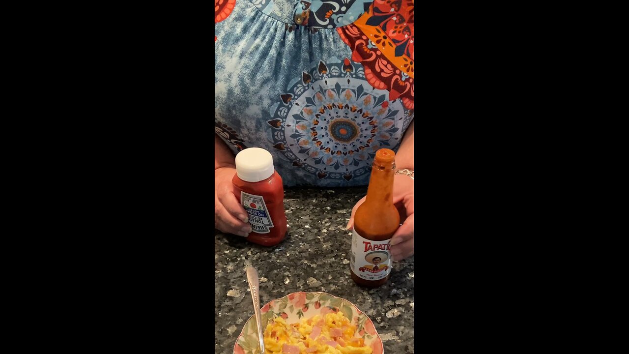 Ketchup or Hot Sauce on Scrambled Eggs