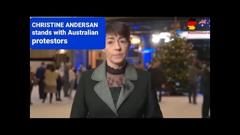 Christine Andersan stands with the Australian protesters