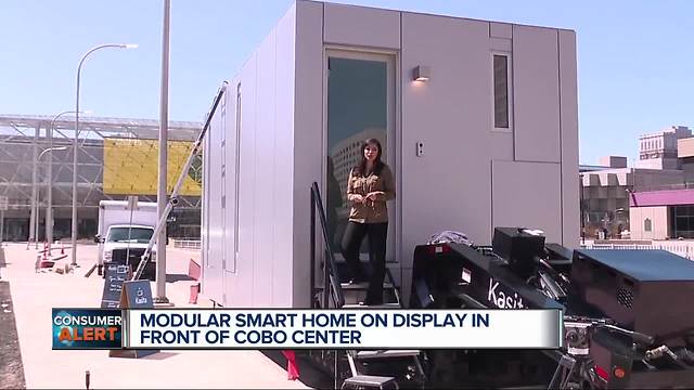 Modular smart home on display in front of Cobo Center