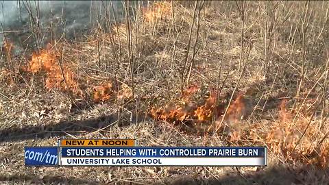 Hartland students burn school prairie to renew ecosystem