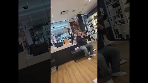 Guy licking a boot vigorously in a shoe store in Kitchener Ontario!