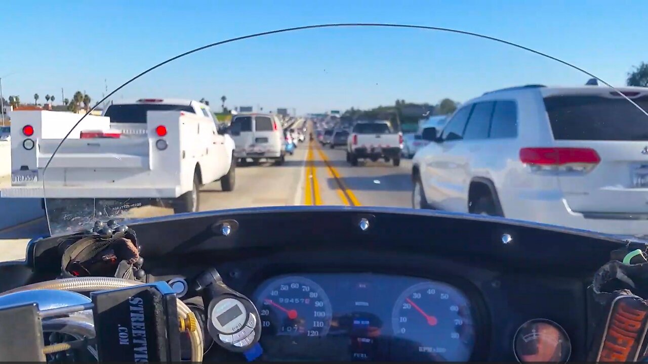 Scooter Tramp Scotty. Lane Splitting In LA.