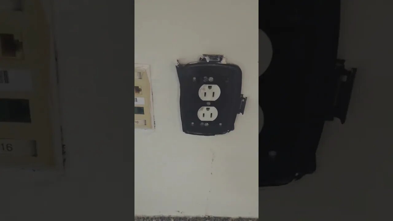 Baruch College electrical outlet on the 4th floor of the vertical building. It's July 13, 2023.