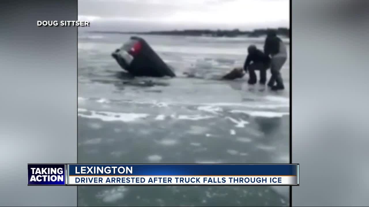 Police arrest driver after truck falls through ice