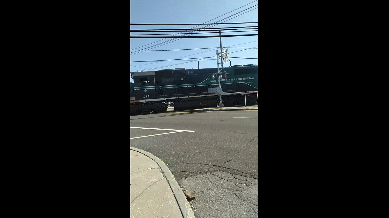 New York Atlantic railway cargo train passing bethpage