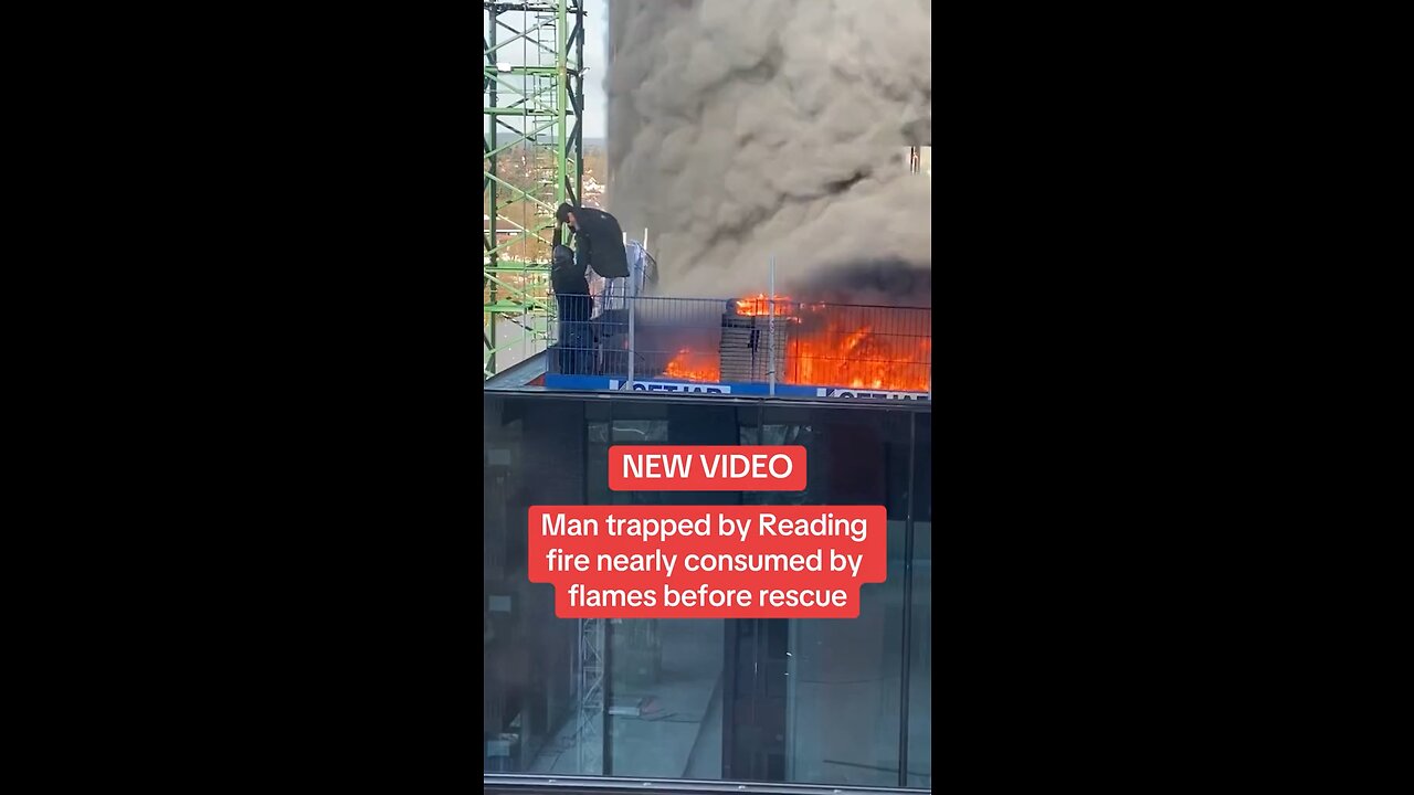 Desperate rescue of a worker amid flames.