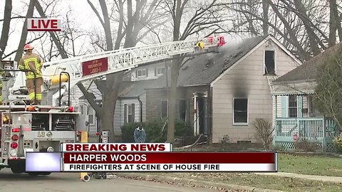 Firefighters at scene of house fire in Harper Woods