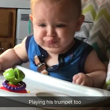 Adorable Baby Plays An Imaginary Trumpet