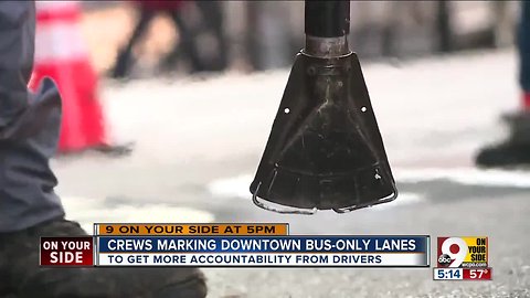 Crews marking Downtown bus-only lanews