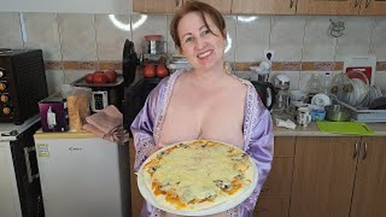 Delicious pizza for you. Cooking show. Nudist kitchen. Mila naturist.