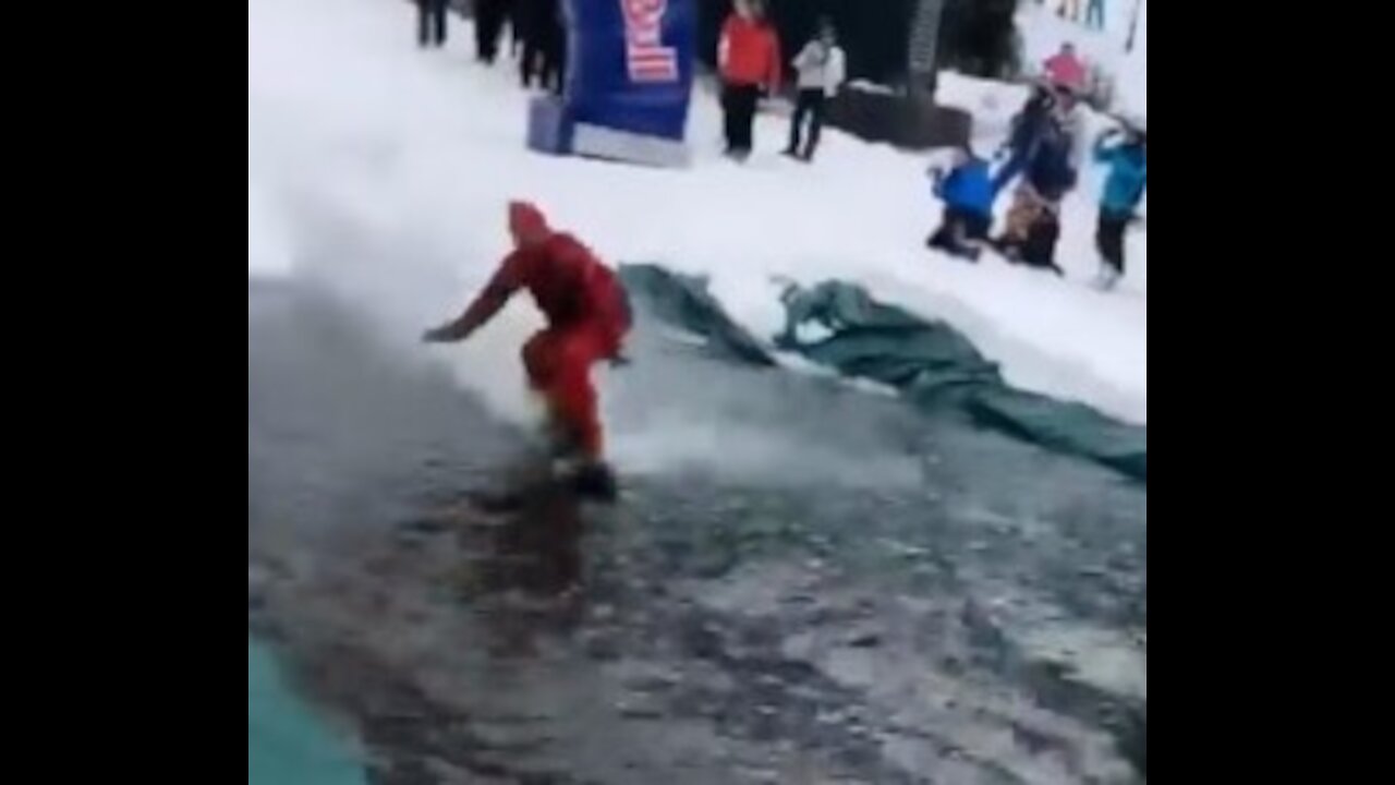 Snowboarder surfing ends up in classic epic fail