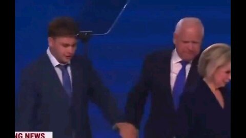 Tim Walz aggressively yanking his son around On Stage in Front of Millions Wtching