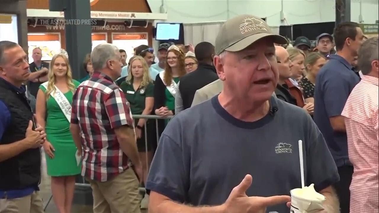 It's a pork chop on a stick and a vanilla shake for Tim Walz at the Minnesota State Fair