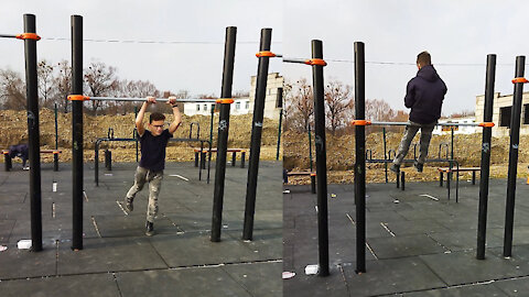 Teenager doing exercises on the horizontal bar