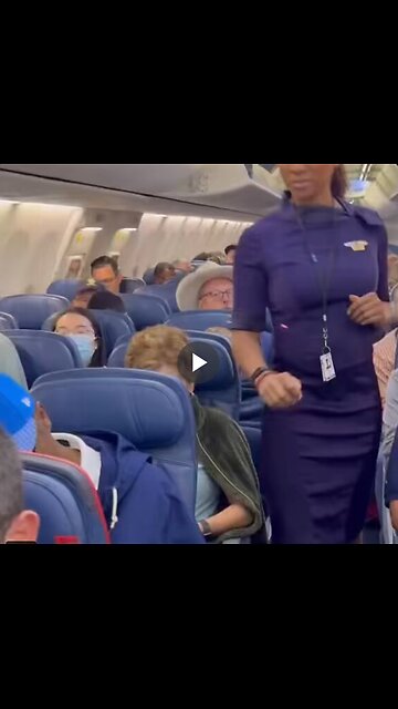 A flight attendant surprised her father, whom she hadn't seen for over a year, during a flight.