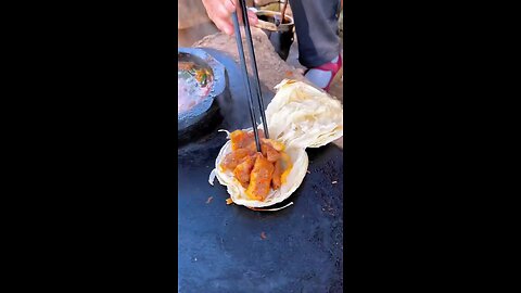 grand mother making chinees burger