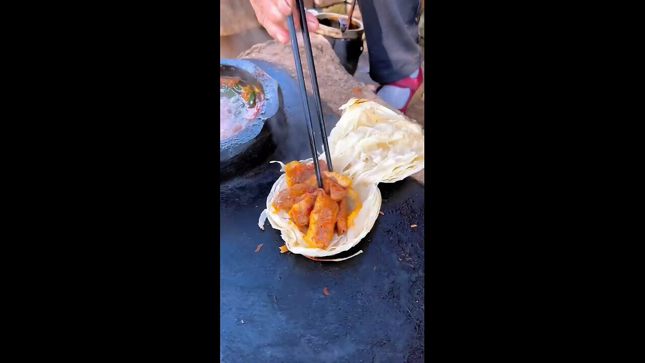 grand mother making chinees burger