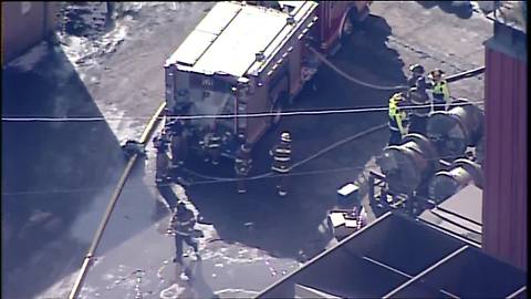 Firefighters clean up after fire at AK Steel in Middletown