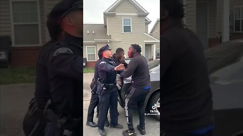 Cops Cuff Men For Recording