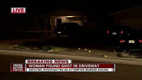 Woman found shot in the driveway