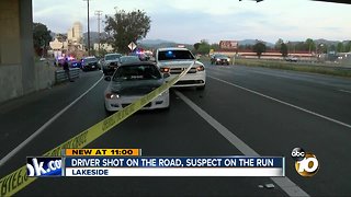 Driver shot on the road, suspect on the run