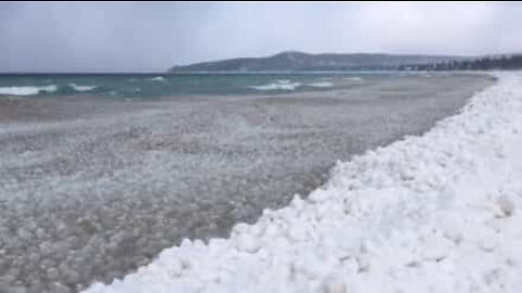 Mysterious ice balls wash ashore at Lake Michigan