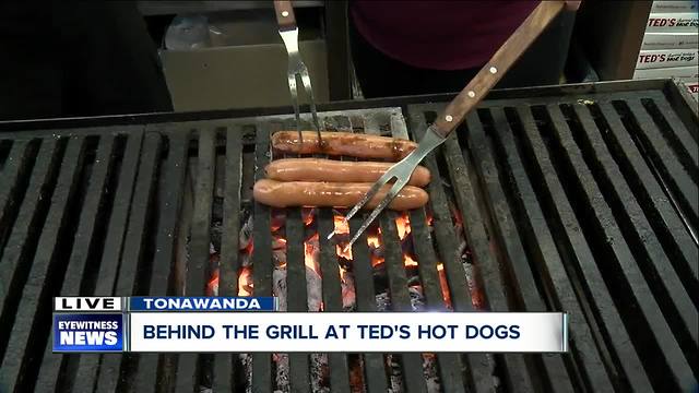 Learning the tricks of the grill at Ted's Hot Dogs