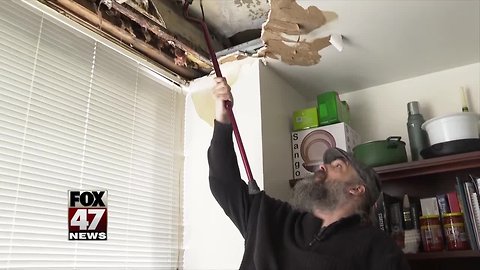 Lansing man wakes up to a collapsed ceiling