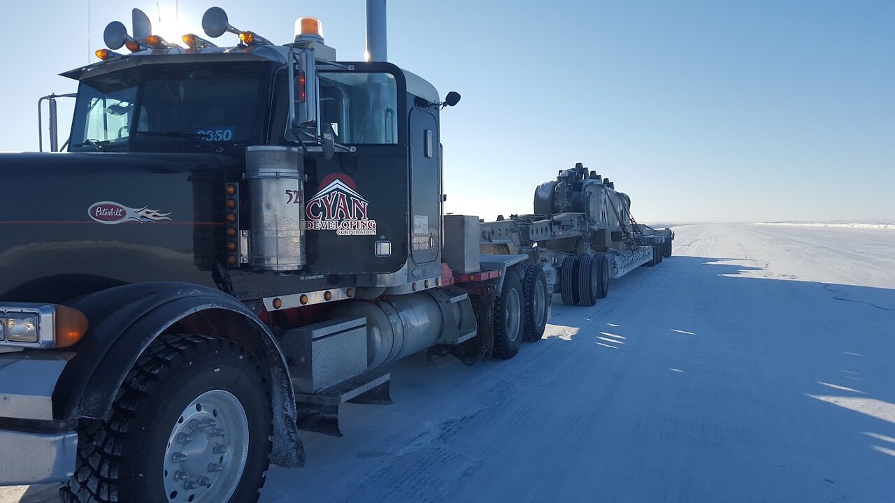 Big Orange Snow Balls 🍊 #catengine #6nz #18speed #truckinglife #trucking #iceroads #iceroadtruckers