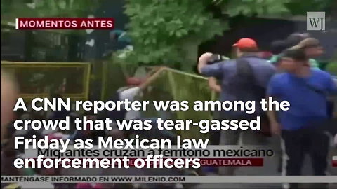 CNN Reporter Hit With Tear Gas While Reporting On Migrant Caravan