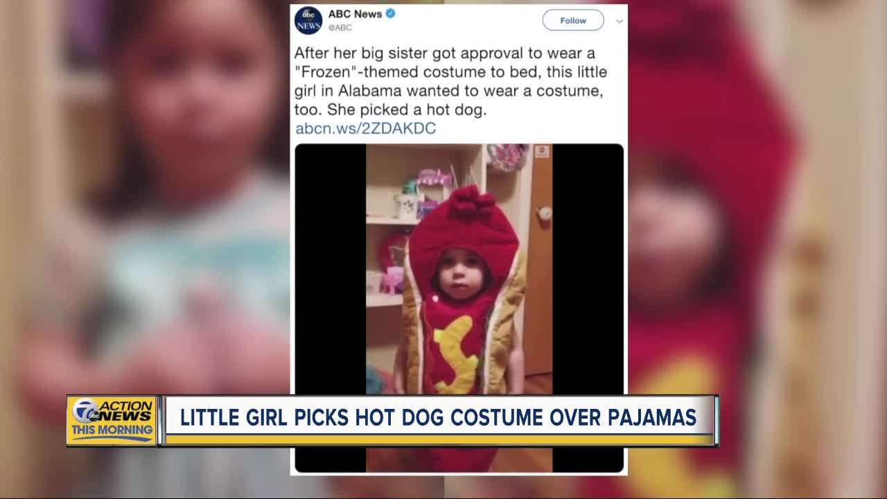 Little Girl picks hot dog costume over pajamas