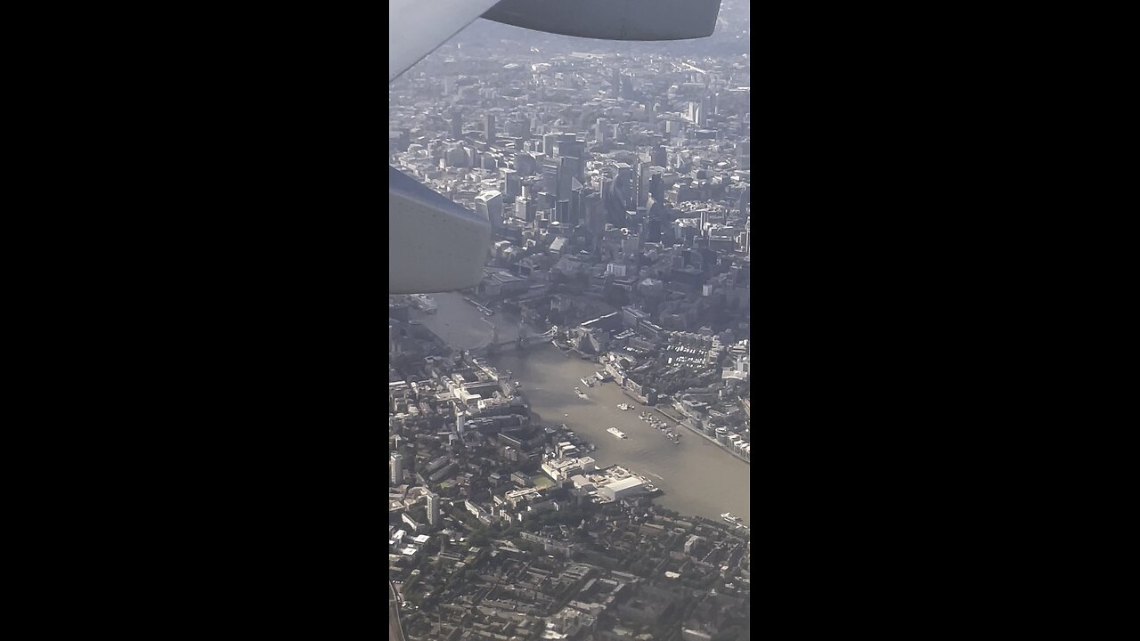 Flying Over London's Iconic Bridge and Thames River!