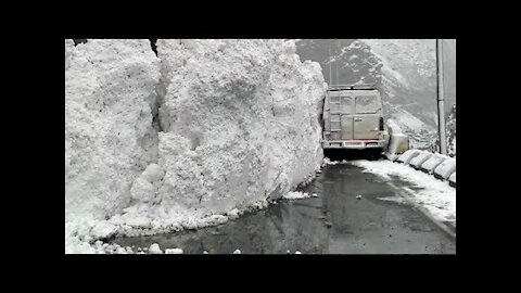 WATCH! SHOCKING 10-ft high glacier wall breaks off, slides onto highway in India