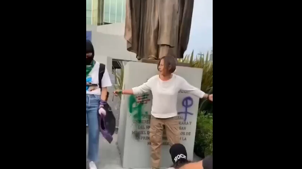 Leftists surround Catholic woman in Mexico as she protects a statue of St. Michael
