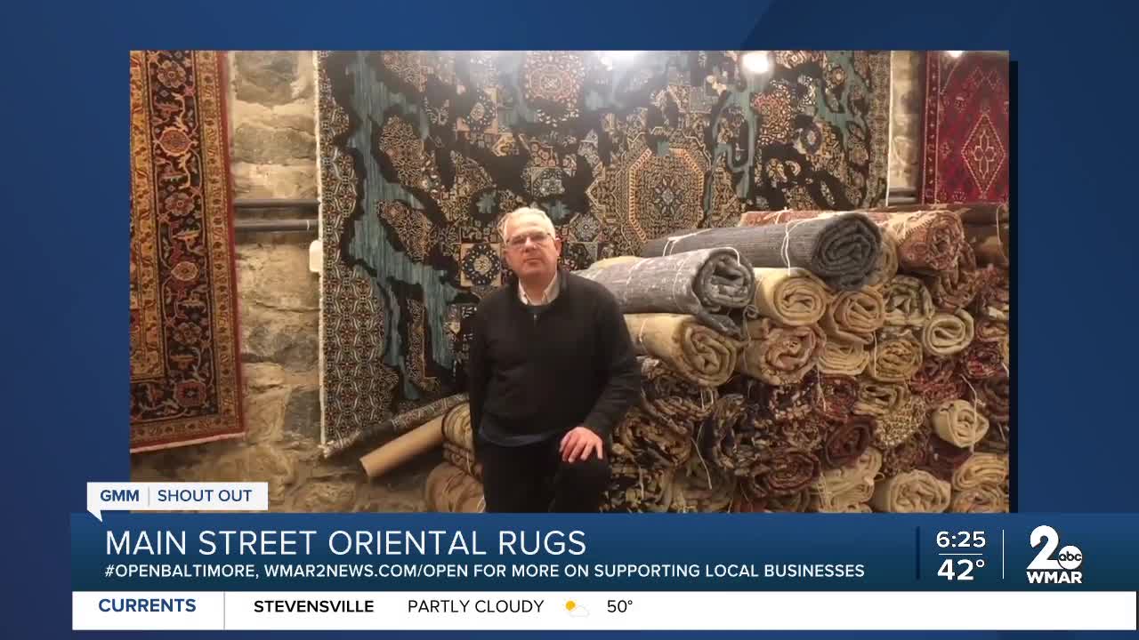 Main Street Oriental Rugs in Ellicott City says "We're Open Baltimore!"