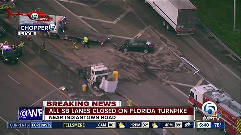 Semi, vehicle crash on Turnpike southbound closes road