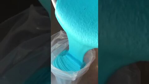 Pouring blue batter