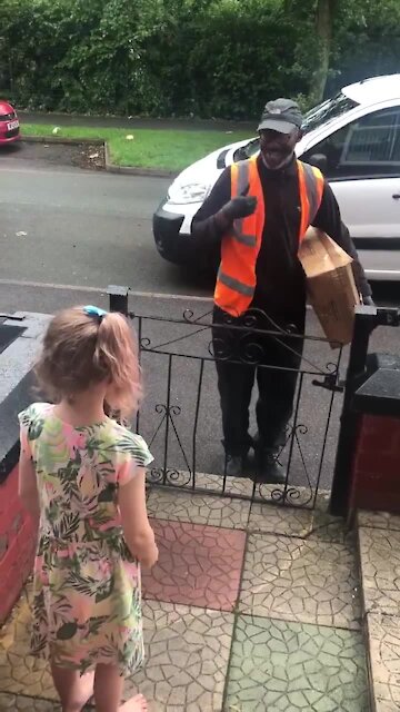 Heart-warming moment little girl greets deaf delivery driver in sign language