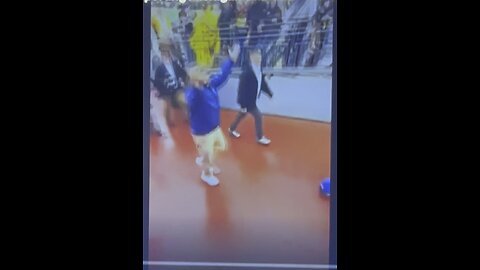 Tim Walz flipping off Michigan student for saying Trump 2024.