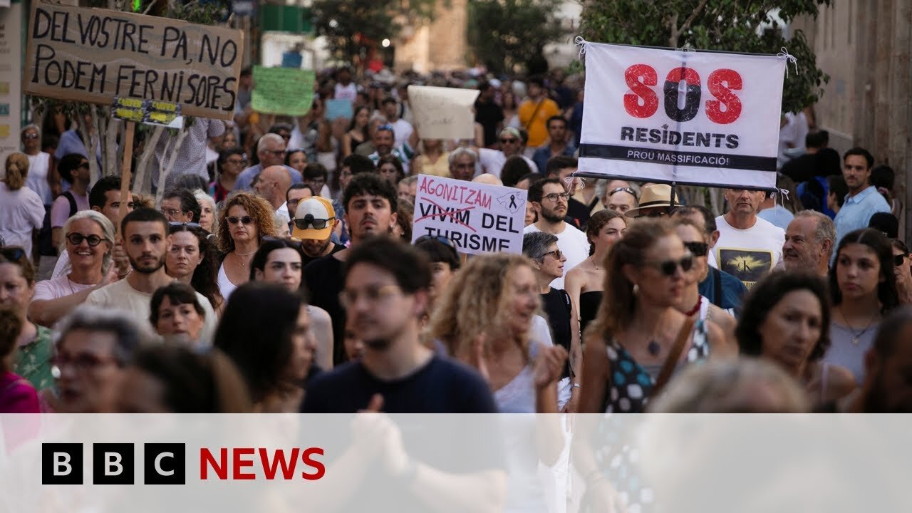 Thousands take part in anti-tourism protests on Spanish island of Majorca | BBC News