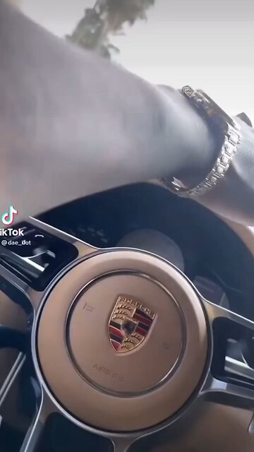 DaeDot riding in Porsche thru Hollywood bumping his music