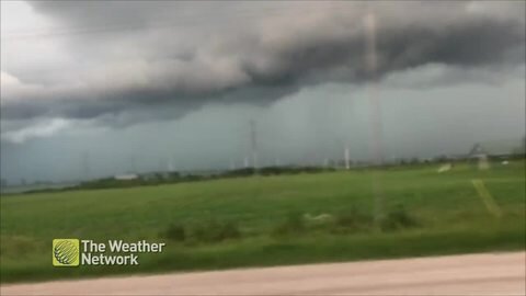 Wall of rain approaches in the distance