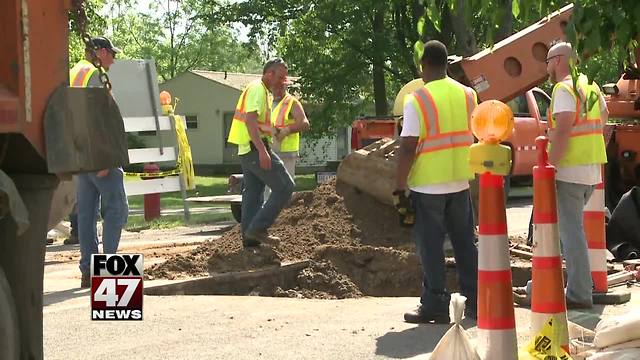 Crews working to fix sinkhole near Lake Lansing