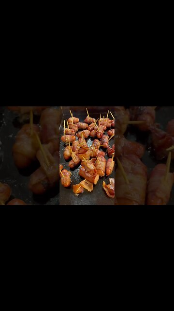 Brown sugar bacon wrapped lil smokies on the flat top. Final